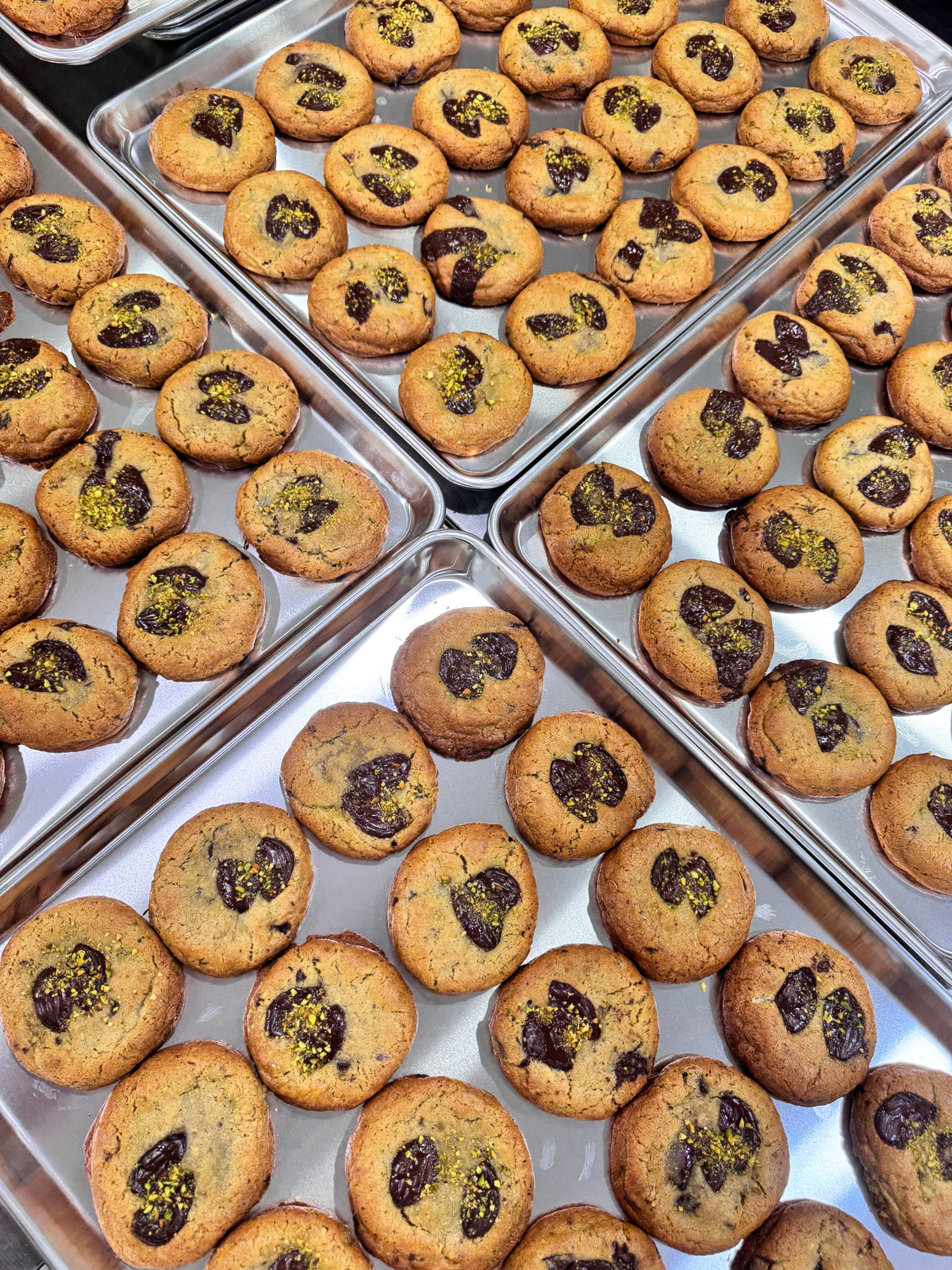 Trays of freshly baked Problem Baker mini cookies